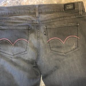 Levi’s gray slightly distressed skinny jeans